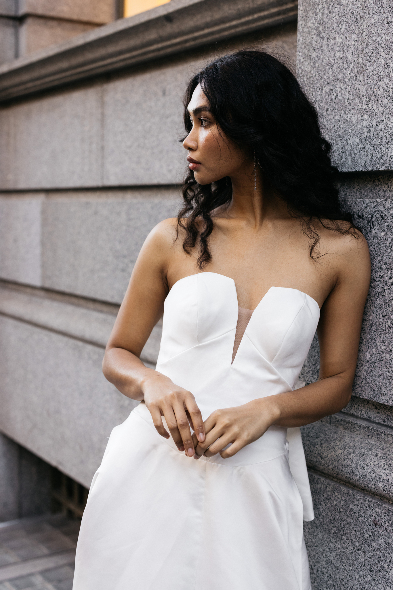 Photo of a model wearing a gown by Alana