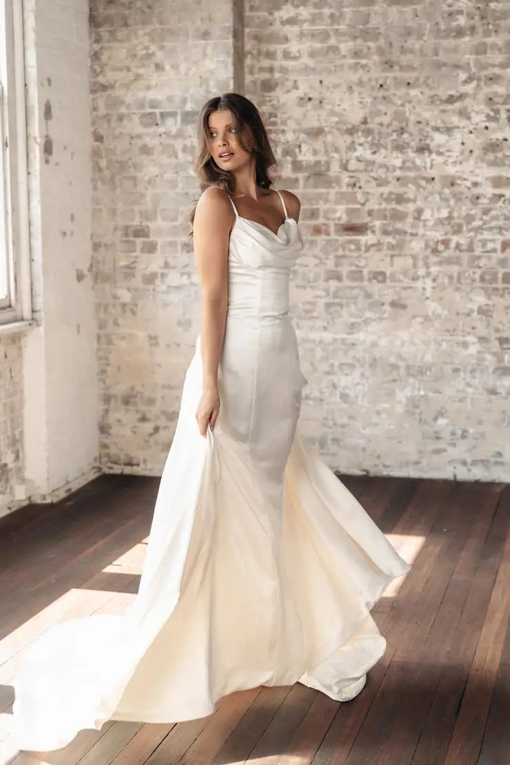 woman wearing expensive charmeuse wedding dress