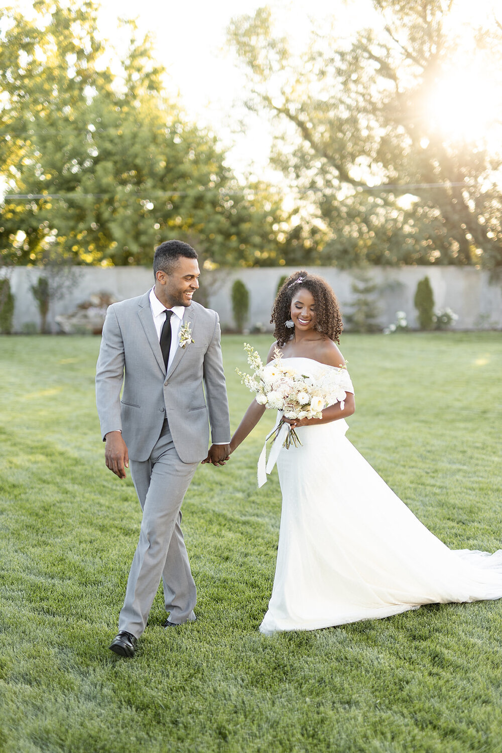 Myron &amp; Olivia wearing Renee Grace Bridal