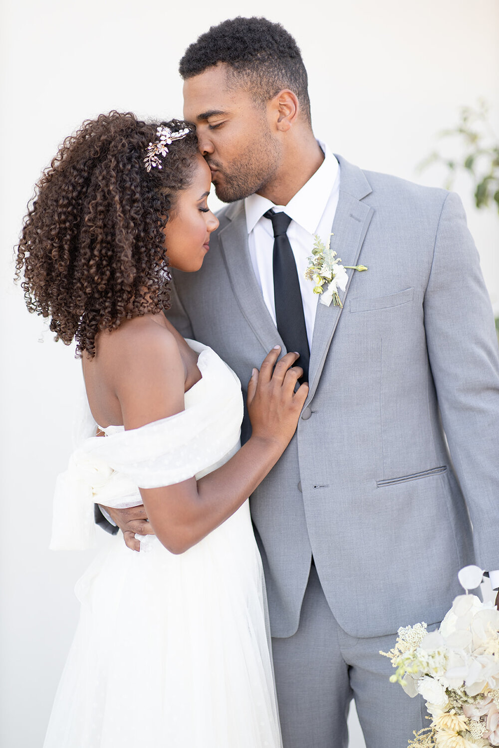 Myron &amp; Olivia wearing Renee Grace Bridal