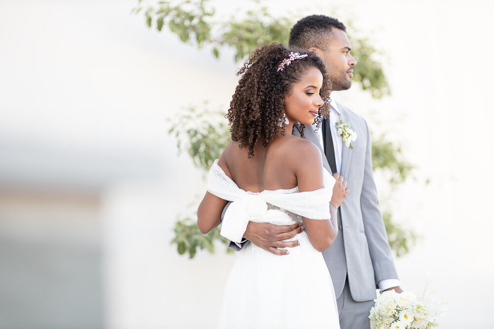 Myron &amp; Olivia wearing Renee Grace Bridal