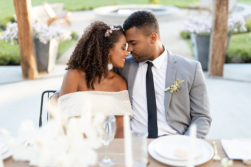Myron &amp; Olivia wearing Renee Grace Bridal