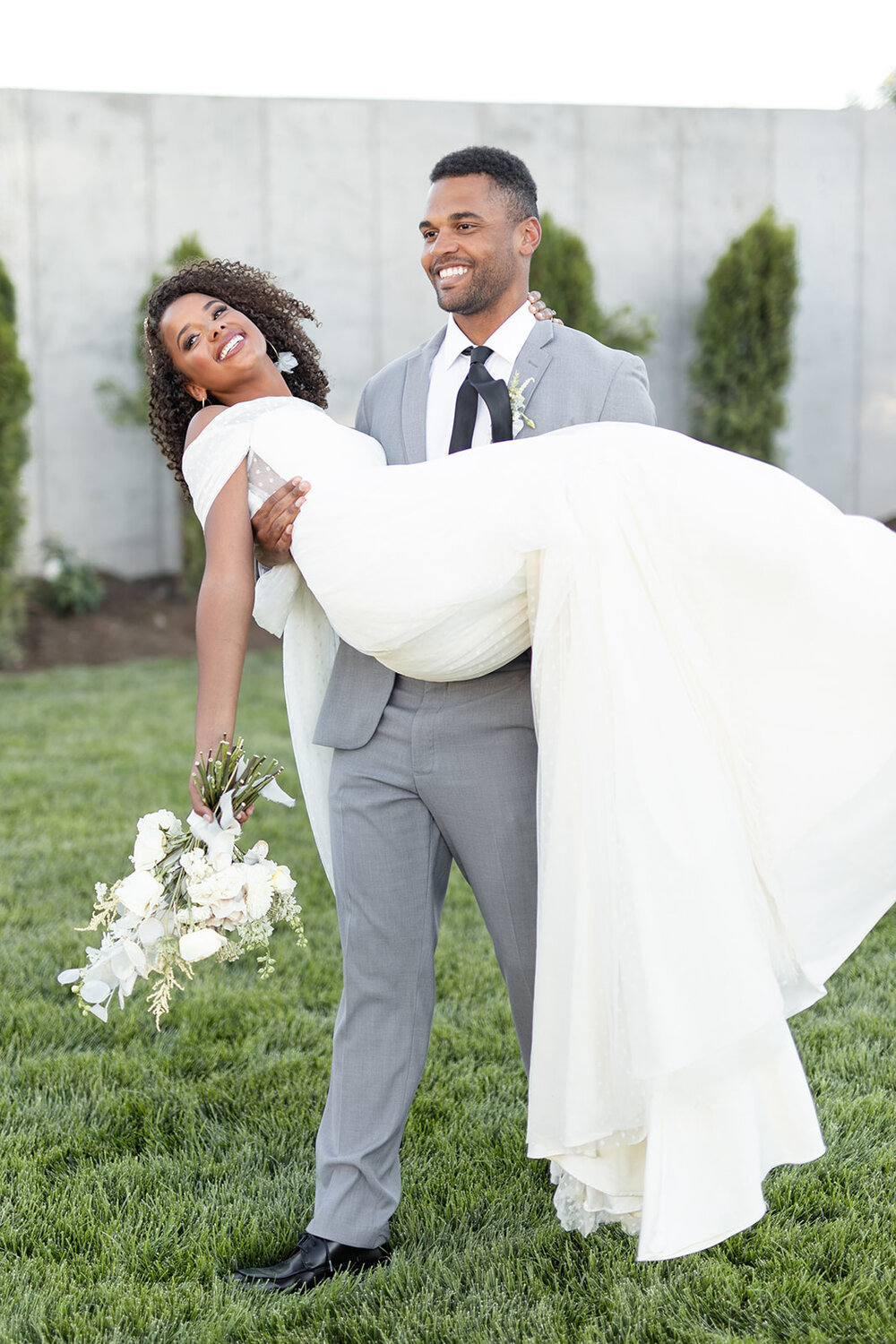 Myron &amp; Olivia wearing Renee Grace Bridal